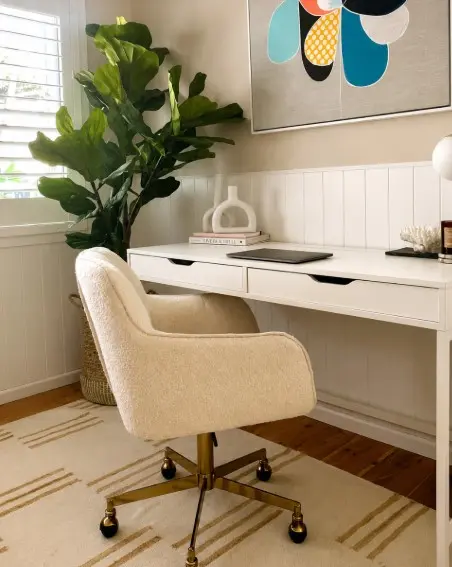 Warm neutral study with and natural light in Forestville home.