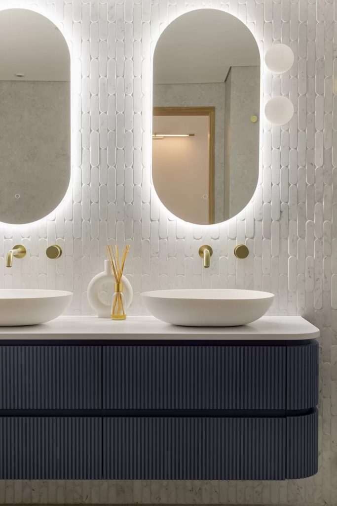 White  oval tiles in a beautiful modern bathroom