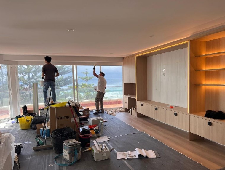 Trades working on an apartment renovation project