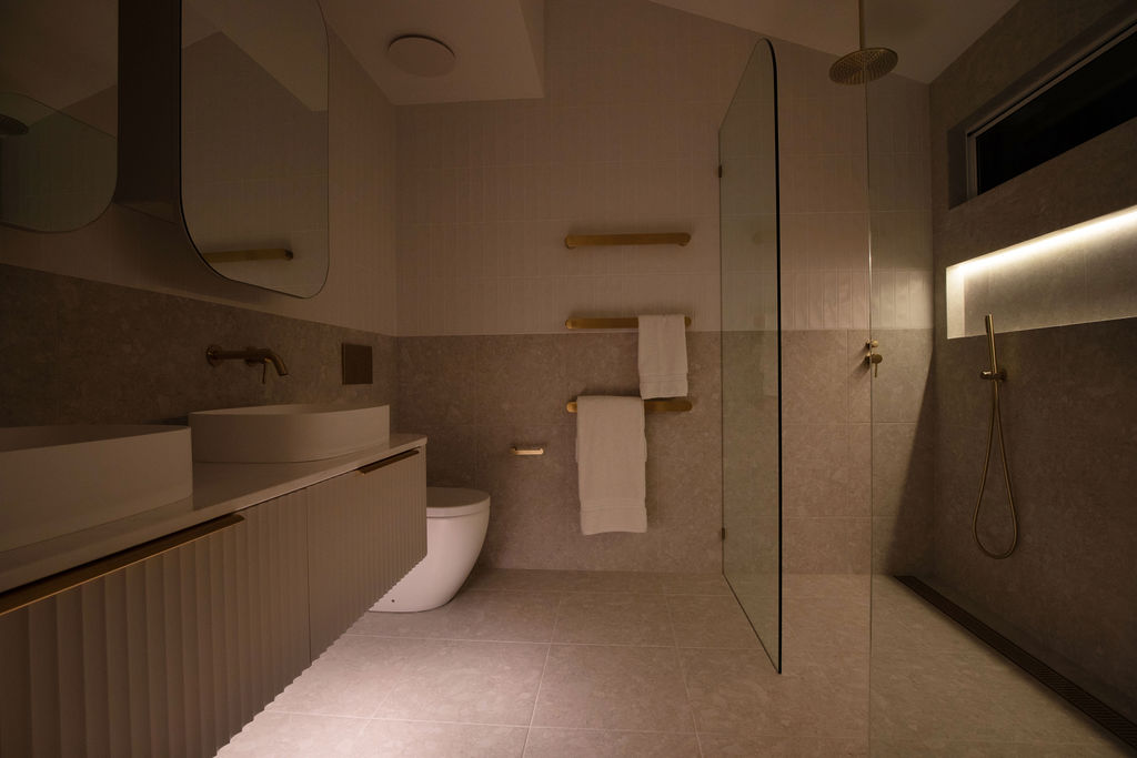 soft lighting in an ensuite bathroom in a full home renovation in Collaroy Northern Beaches
