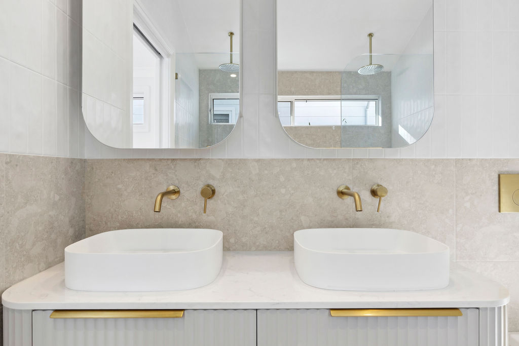 Interior design specified bathroom fittings and cabinetry in a full home renovation in Collaroy