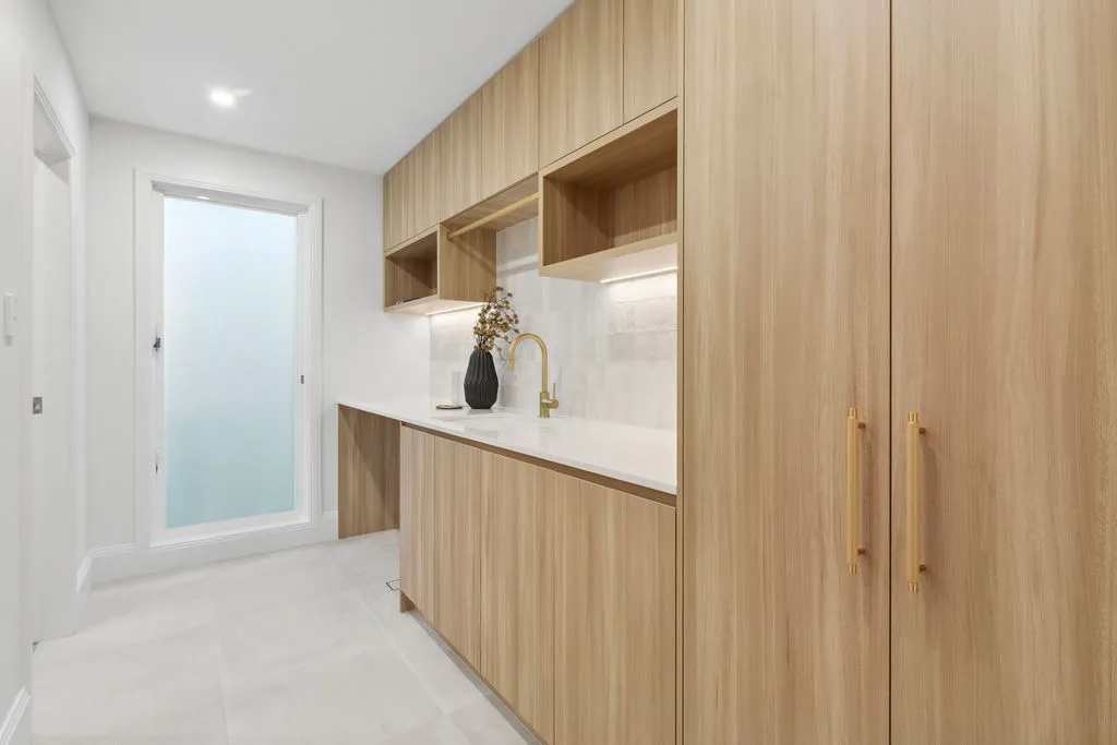 Custom cabinetry in a laundry in a full home renovation in Collaroy