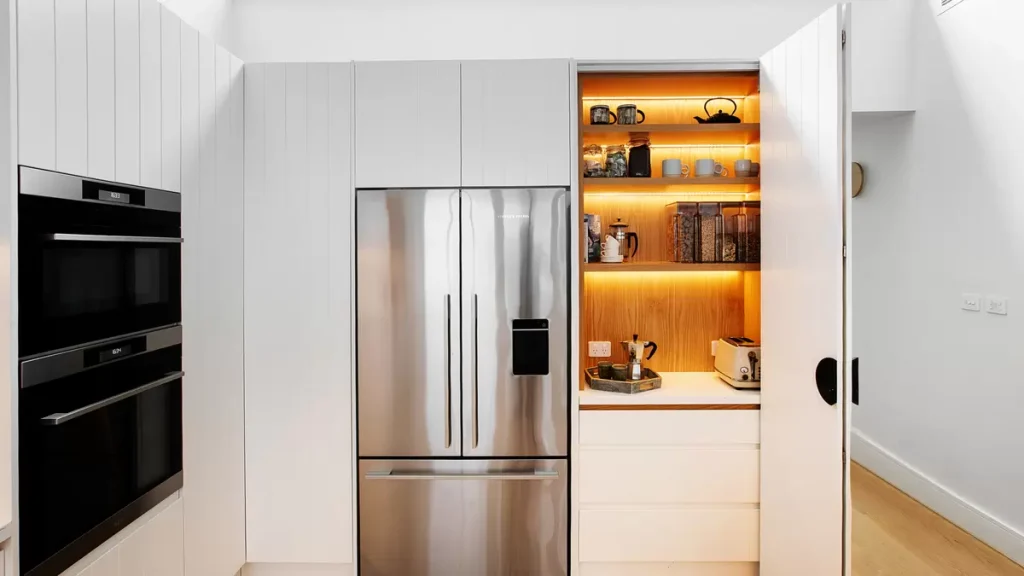Pantry and appliance storage in an interior designed kitchen in Manly Vale.