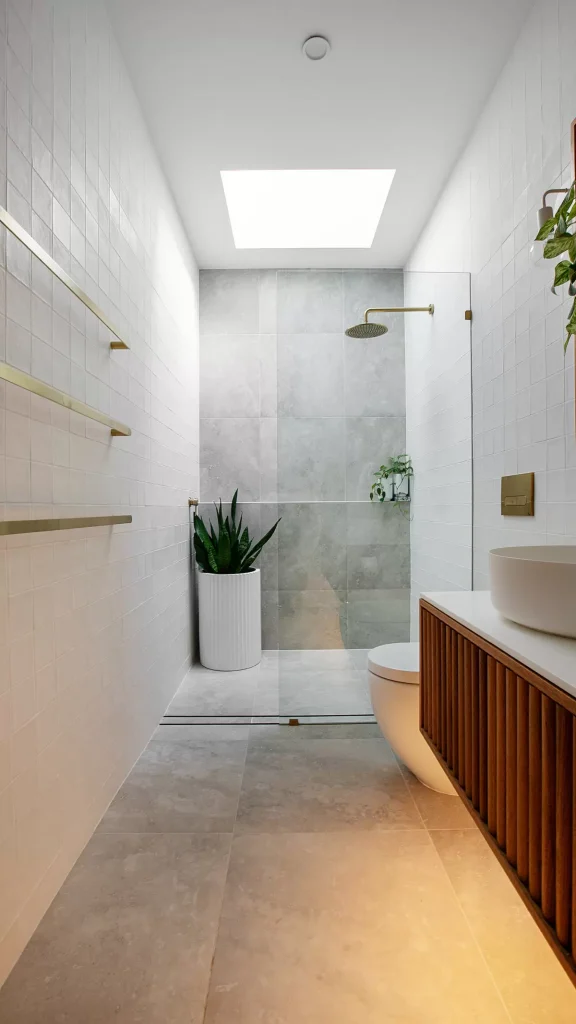 warm tones of a bespoke bathroom renovation in Manly Vale, Sydney